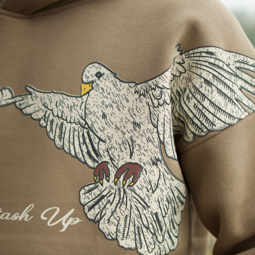 PEACE IN MOTION-TAUPE